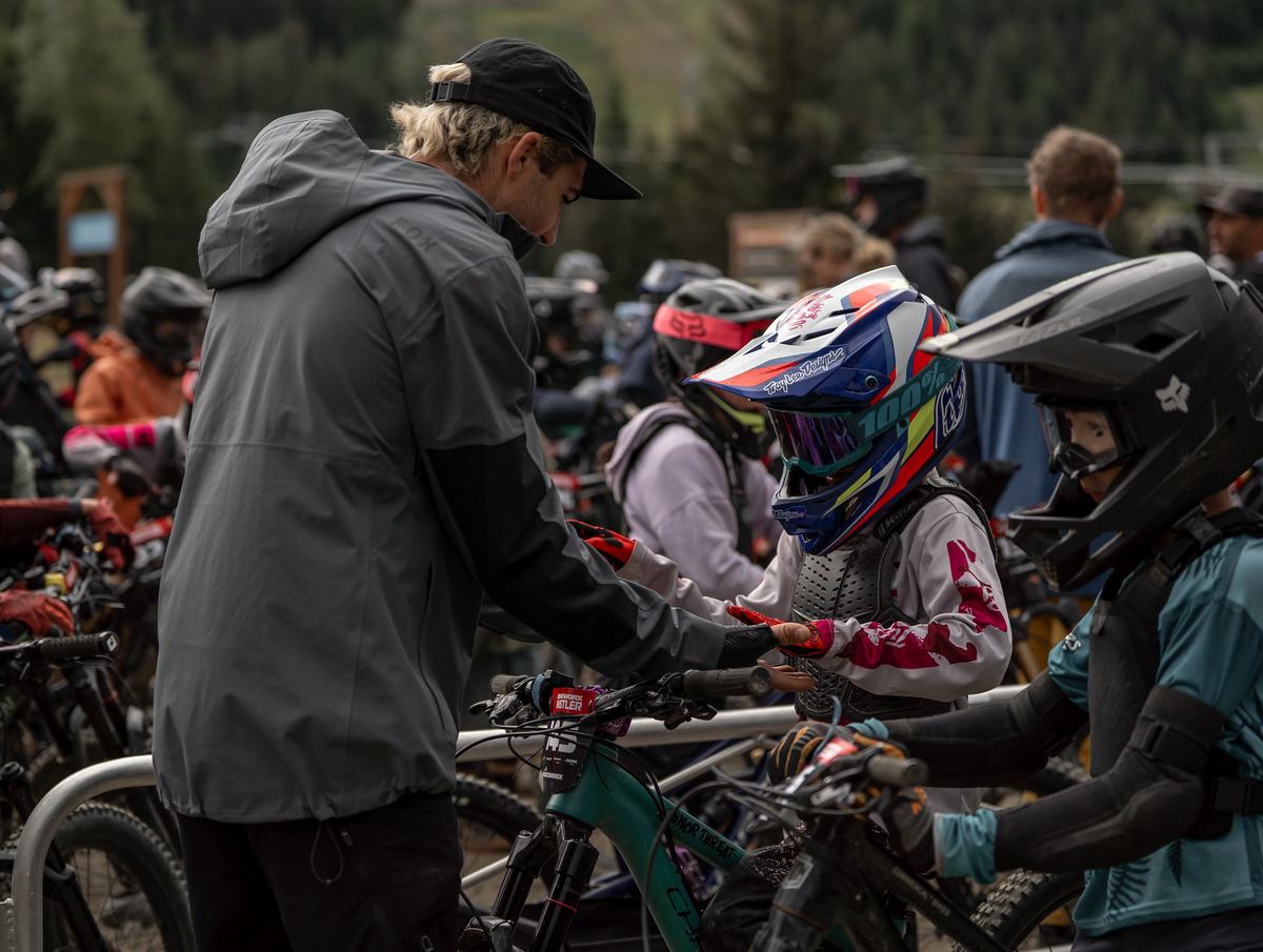 Kids gearing up in the Kidsworx pits