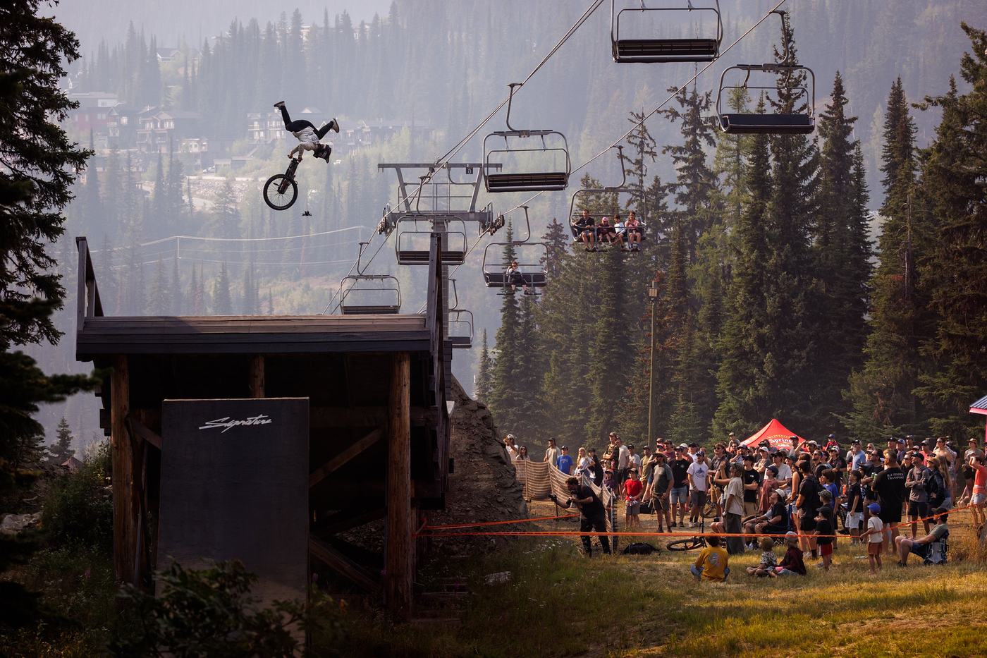 Rider whips under the chairlift at SilverStar